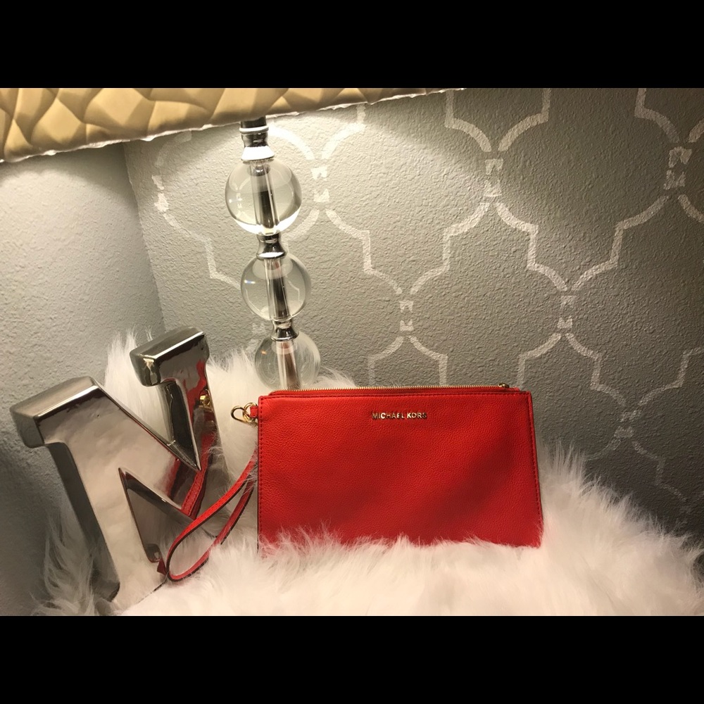 Red MK leather clutch